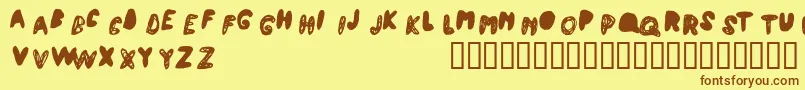 Atchy Font – Brown Fonts on Yellow Background