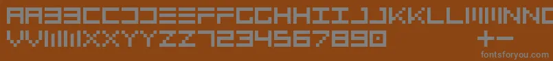 Topo-Schriftart – Graue Schriften auf braunem Hintergrund