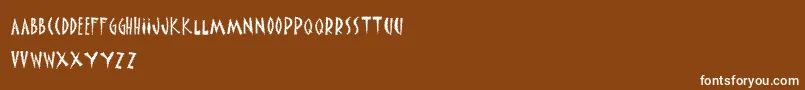 InkyNews Font – White Fonts on Brown Background