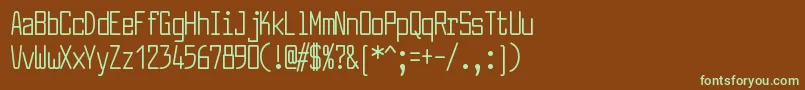 フォントLarabiefontcpRegular – 緑色の文字が茶色の背景にあります。