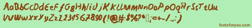 Nedswriting-Schriftart – Braune Schriften auf grünem Hintergrund
