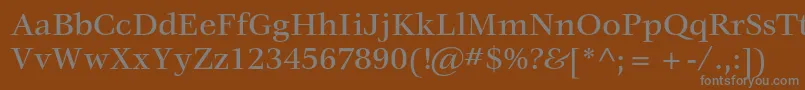 VeljovicstdMedium-Schriftart – Graue Schriften auf braunem Hintergrund