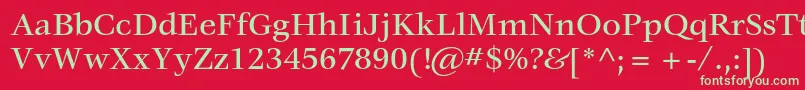 VeljovicstdMedium-Schriftart – Grüne Schriften auf rotem Hintergrund