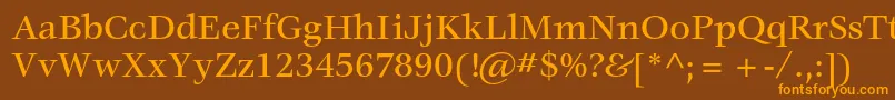 フォントVeljovicstdMedium – オレンジ色の文字が茶色の背景にあります。