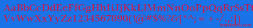 VeljovicstdMedium-Schriftart – Rote Schriften auf blauem Hintergrund