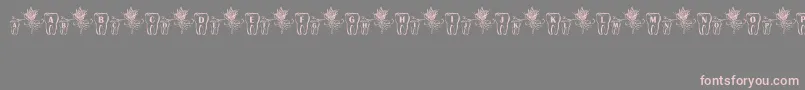 fuente ToothFairy – Fuentes Rosadas Sobre Fondo Gris