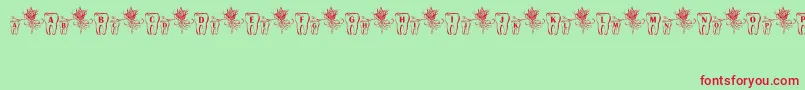 ToothFairy-Schriftart – Rote Schriften auf grünem Hintergrund