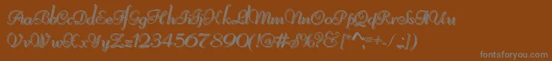 Шрифт ReliantShadowFree – серые шрифты на коричневом фоне