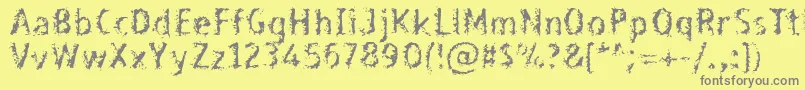 Bleed-fontti – harmaat kirjasimet keltaisella taustalla
