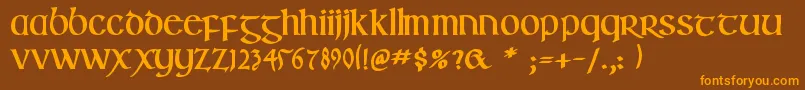 IrishuncialfabetaBold Font – Orange Fonts on Brown Background