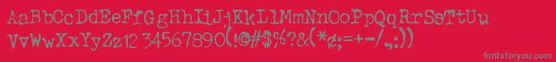 TypewriterOldstyle-Schriftart – Graue Schriften auf rotem Hintergrund