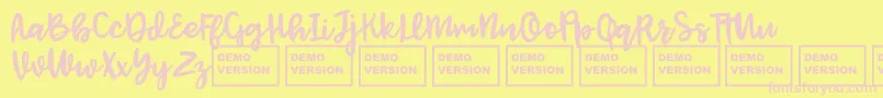 Czcionka JenthillDemo – różowe czcionki na żółtym tle