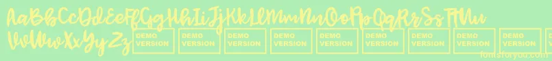 フォントJenthillDemo – 黄色の文字が緑の背景にあります