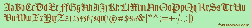 Goudytextmtstd Font – Brown Fonts on Green Background