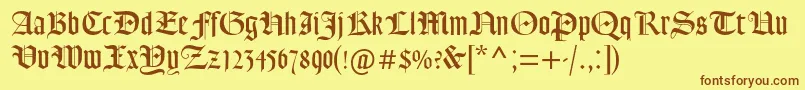 Goudytextmtstd Font – Brown Fonts on Yellow Background