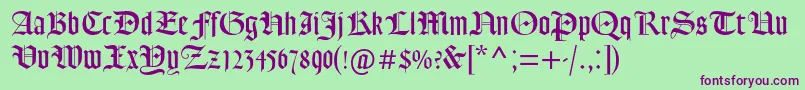 Goudytextmtstd-Schriftart – Violette Schriften auf grünem Hintergrund