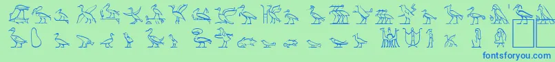 HyroglyphesTwo-Schriftart – Blaue Schriften auf grünem Hintergrund