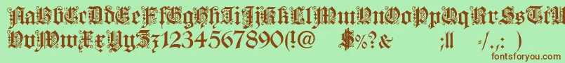 Czcionka FortunaGothicFlorishc – brązowe czcionki na zielonym tle