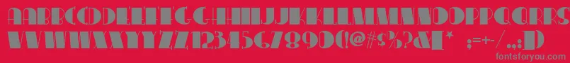 フォントConga – 赤い背景に灰色の文字