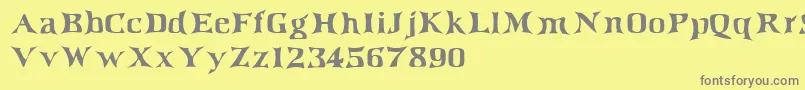 フォントIrishjig – 黄色の背景に灰色の文字