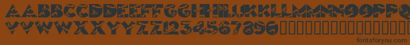 Halloweenkiddyfont-Schriftart – Schwarze Schriften auf braunem Hintergrund