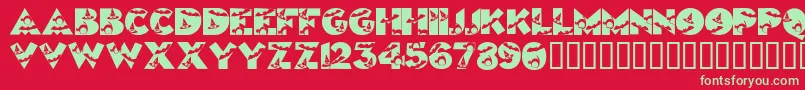 Halloweenkiddyfont-Schriftart – Grüne Schriften auf rotem Hintergrund