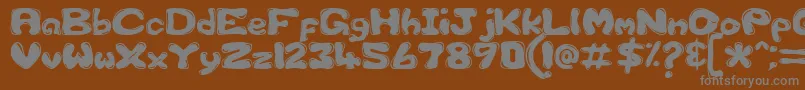 Gfscus1d Font – Gray Fonts on Brown Background