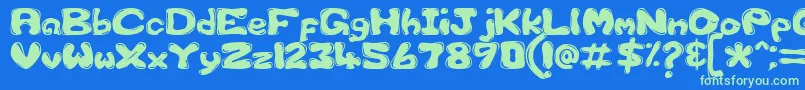 Gfscus1d-Schriftart – Grüne Schriften auf blauem Hintergrund