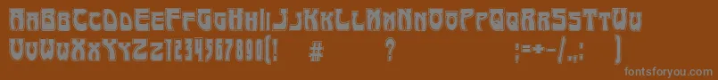 ArtNouveau1895Contour Font – Gray Fonts on Brown Background