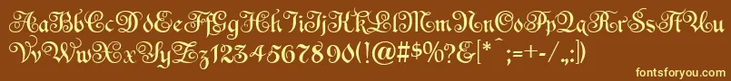 EspaniaNormal Font – Yellow Fonts on Brown Background