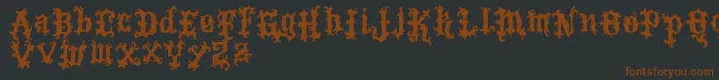 VtksTattoo Font – Brown Fonts on Black Background