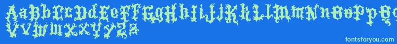 VtksTattoo Font – Green Fonts on Blue Background