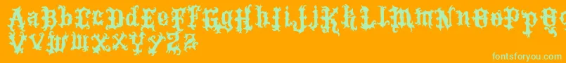 VtksTattoo Font – Green Fonts on Orange Background