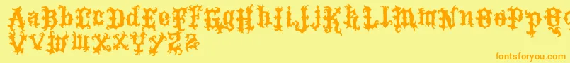 VtksTattoo Font – Orange Fonts on Yellow Background