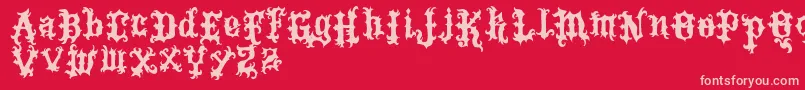 VtksTattoo-fontti – vaaleanpunaiset fontit punaisella taustalla