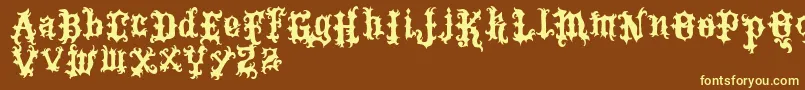 VtksTattoo Font – Yellow Fonts on Brown Background