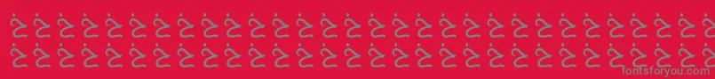フォントAlmusamFree – 赤い背景に灰色の文字