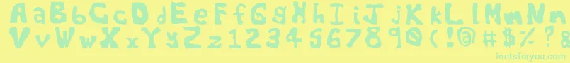 Worldsworstfont Font – Green Fonts on Yellow Background