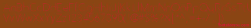 TrueTypola Font – Red Fonts on Brown Background