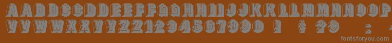 Leecaps-fontti – harmaat kirjasimet ruskealla taustalla