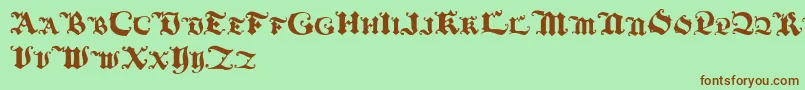 Blackinitialtext Font – Brown Fonts on Green Background