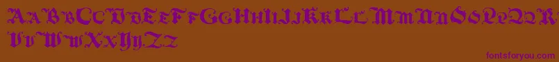 Blackinitialtext Font – Purple Fonts on Brown Background