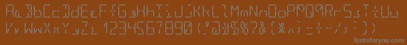 Segment16aRegular-fontti – harmaat kirjasimet ruskealla taustalla