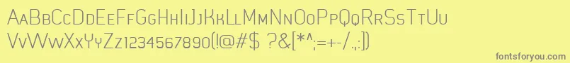 MistergiaccoLightcaps Font – Gray Fonts on Yellow Background