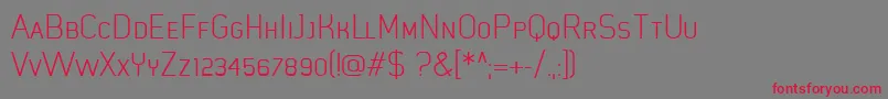 フォントMistergiaccoLightcaps – 赤い文字の灰色の背景