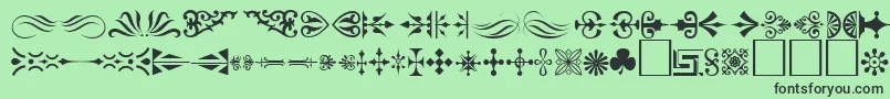 Ornament ffy-fontti – mustat fontit vihreällä taustalla