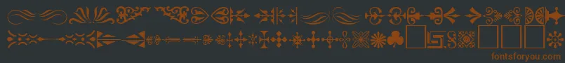 Ornament ffy-fontti – ruskeat fontit mustalla taustalla