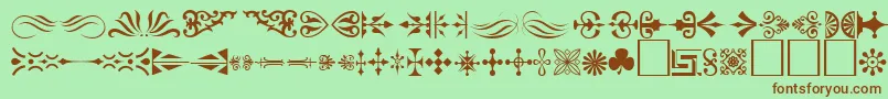 Ornament ffy-Schriftart – Braune Schriften auf grünem Hintergrund