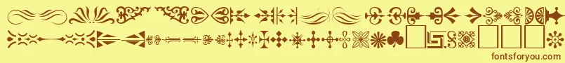 Ornament ffy-Schriftart – Braune Schriften auf gelbem Hintergrund