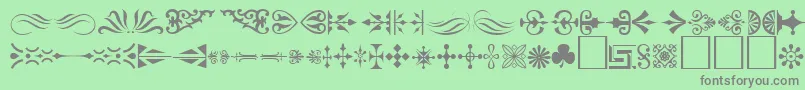 Ornament ffy-Schriftart – Graue Schriften auf grünem Hintergrund